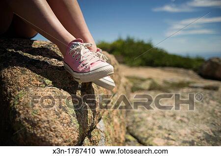 Detail of female wearing pink sneakers resting on rock Acadia National Park, Bar Harbor ME View Large Photo Image Stock Image - Detail of female wearing pink sneakers resting on rock Acadia National Park, Bar Harbor ME. Fotosearch