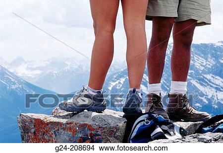 Picture - Detail of hikers? legs on mountain summit. Banff NP. Alberta. Canada. Fotosearch