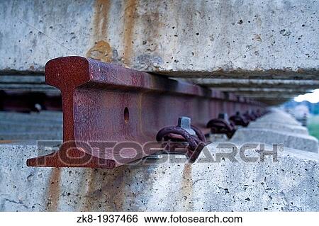 Detail of old rusty train track View Large Photo Image Stock Photograph - Detail of old rusty train track. Fotosearch