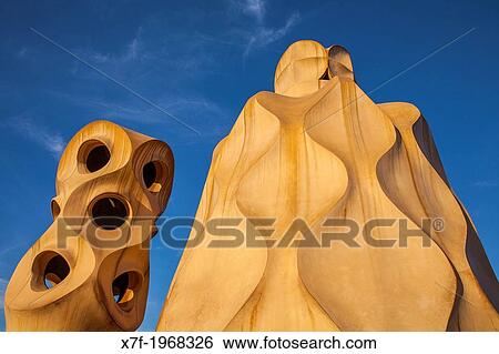Detail of rooftop Chimneys in Casa Mila, La Pedrera, Barcelona, Catalonia, Spain. View Large Photo Image Stock Photograph - Detail of rooftop Chimneys in Casa Mila, La Pedrera, Barcelona, Catalonia, Spain.. Fotosearch