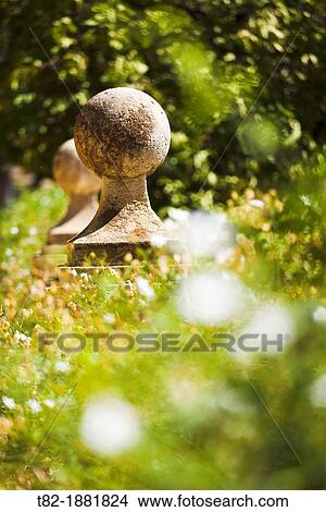 detail of stone with plants in the gardens of the Alcazar, Sevilla, Andalucia, Spain View Large Photo Image Picture - detail of stone with plants in the gardens of the Alcazar, Sevilla, Andalucia, Spain. Fotosearch