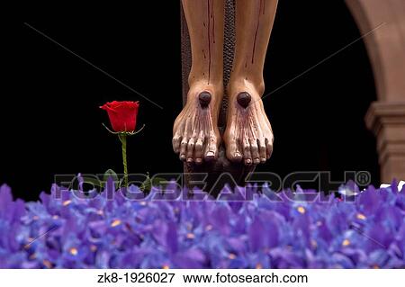 Detail of the crucified Christ, feet anchored to the cross with nails, Spain View Large Photo Image Stock Photo - Detail of the crucified Christ, feet anchored to the cross with nails, Spain. Fotosearch