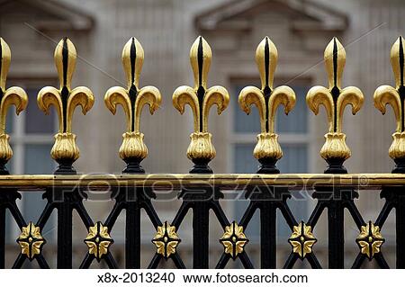 Stock Image - Detail of the exterior gate of Buckingham Palace, London, UK.. Fotosearch
