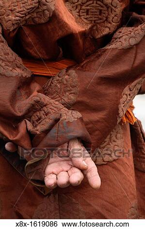 Stock Photograph - Detail of traditional mongolian clothes Mongolia. Fotosearch