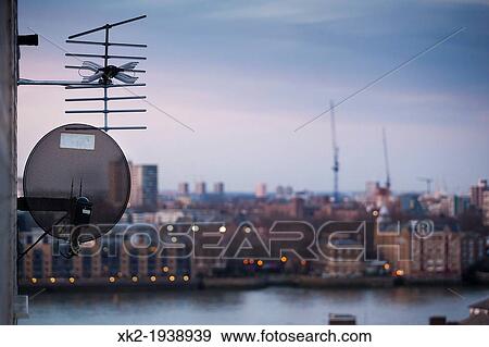Detail of TV aerial attached in the front of the house, London, UK View Large Photo Image Stock Photo - Detail of TV aerial attached in the front of the house, London, UK. Fotosearch