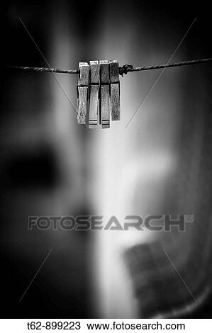 Stock Image - Detail of tweezers to lay clothes in a fisherman's house in La Isleta del Moro, Cabo de Gata, Almer? a, Andalusia, Spain. Fotosearch