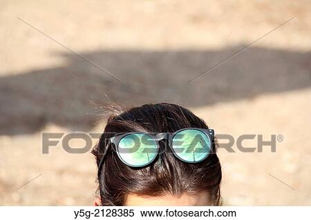 detail of woman wearing sunglasses View Large Photo Image Stock Photography - detail of woman wearing sunglasses. Fotosearch