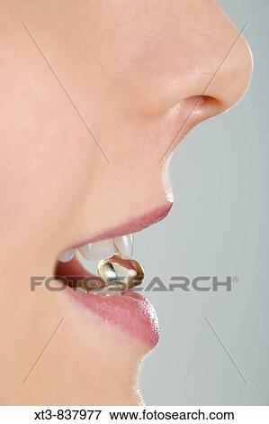detail of woman's face with vitamine E View Large Photo Image Stock Photo - detail of woman's face with vitamine E. Fotosearch