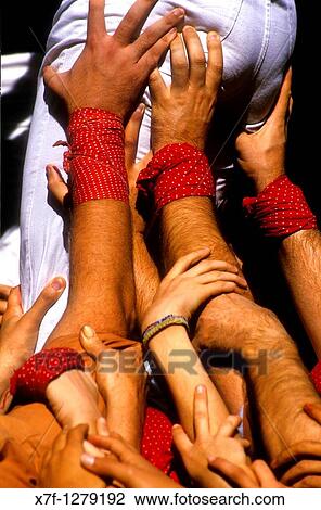 Detail of Xiquets de Reus? Castellers? building human tower, a Catalan tradition Pla? a Nova Alcover Tarragona province, Catalonia, Spain View Large Photo Image Stock Image - Detail of Xiquets de Reus? Castellers? building human tower, a Catalan tradition Pla? a Nova Alcover Tarragona province, Catalonia, Spain. Fotosearch