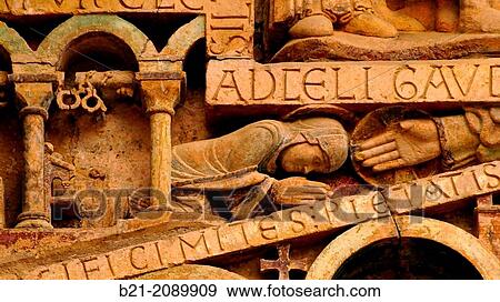 Detail on the tympanum, abbey-church of Saint-Foy, Conques, Way of St James, Aveyron, Midi-Pyr? n? es, France View Large Photo Image Stock Photo - Detail on the tympanum, abbey-church of Saint-Foy, Conques, Way of St James, Aveyron, Midi-Pyr? n? es, France. Fotosearch