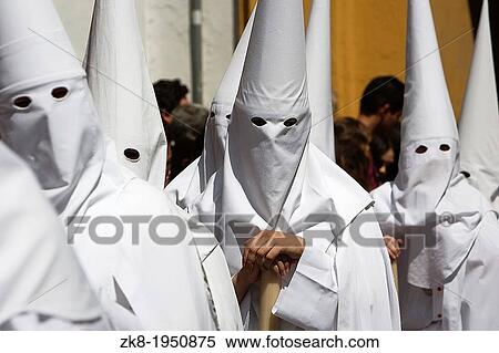 Detail penitent white holding a candle during Holy Week, Spain. View Large Photo Image Stock Photography - Detail penitent white holding a candle during Holy Week, Spain.. Fotosearch