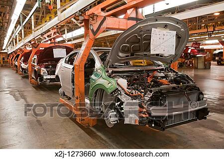 Detroit, Michigan - A Chevrolet Volt on the assembly line at General Motors? Detroit-Hamtramck Assembly Plant The Volt is powered by electricity, it uses a small gasoline engine to generate electricity after the car's lithium-ion battery is depleted View Large Photo Image Stock Image - Detroit, Michigan - A Chevrolet Volt on the assembly line at General Motors? Detroit-Hamtramck Assembly Plant The Volt is powered by electricity, it uses a small gasoline engine to generate electricity after the car's lithium-ion battery is depleted. Fotosearch