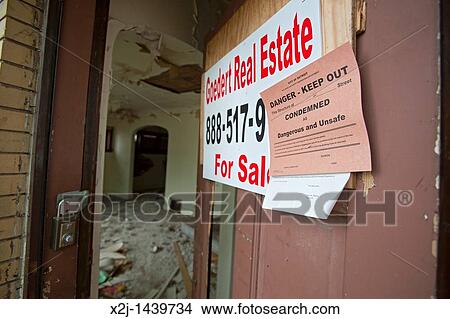 Detroit, Michigan - A vacant and condemned house in an east side neighborhood Detroit's population has shrunk to just over 700, 000, from nearly two million 60 years ago View Large Photo Image Picture - Detroit, Michigan - A vacant and condemned house in an east side neighborhood Detroit's population has shrunk to just over 700, 000, from nearly two million 60 years ago. Fotosearch
