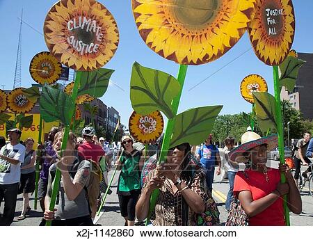 Detroit, Michigan - Activists for various social justice causes march through the streets of Detroit on the opening day of the United States Social Forum Environmentalists were part of the crowd View Large Photo Image Stock Image - Detroit, Michigan - Activists for various social justice causes march through the streets of Detroit on the opening day of the United States Social Forum Environmentalists were part of the crowd. Fotosearch