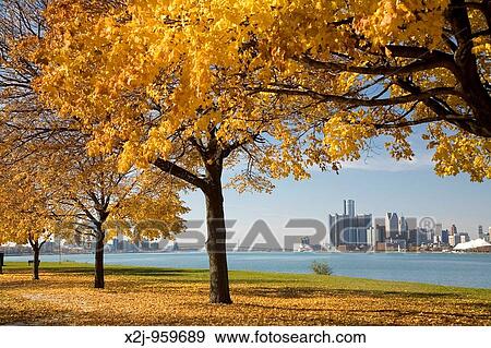Detroit, Michigan - Downtown Detroit and the Detroit River from Belle Isle, an island city park The tallest building is General Motors headquarters in the Renaissance Center View Large Photo Image Stock Photo - Detroit, Michigan - Downtown Detroit and the Detroit River from Belle Isle, an island city park The tallest building is General Motors headquarters in the Renaissance Center. Fotosearch