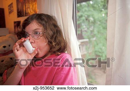 Detroit, Michigan - Eleven-year-old Mariel West uses an inhaler for her asthma MR View Large Photo Image Stock Image - Detroit, Michigan - Eleven-year-old Mariel West uses an inhaler for her asthma MR. Fotosearch