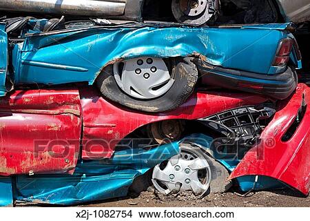 Detroit, Michigan - Junk cars crushed and ready for recycling at a scrap yard View Large Photo Image Picture - Detroit, Michigan - Junk cars crushed and ready for recycling at a scrap yard. Fotosearch