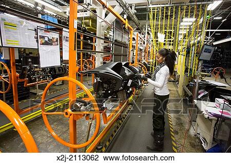 Detroit, Michigan - Members of the United Auto Workers union build dashboards for Ford vehicles at Detroit Manufacturing Systems. View Large Photo Image Stock Image - Detroit, Michigan - Members of the United Auto Workers union build dashboards for Ford vehicles at Detroit Manufacturing Systems.. Fotosearch