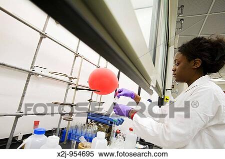 Stock Photography - Detroit, Michigan - Myriame Moume-Pymbock, a chemistry graduate student from France, works on an experiment in a laboratory at Wayne State University. Fotosearch