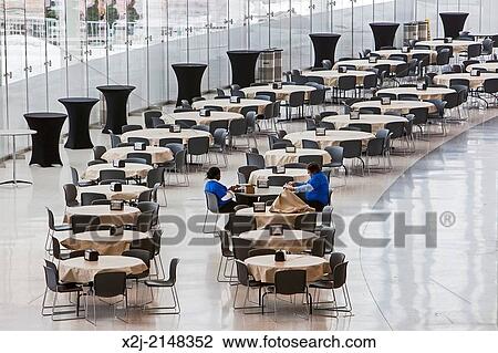 Detroit, Michigan - Two workers in a mostly-empty food court in Cobo Hall, Detroit's convention center. View Large Photo Image Stock Image - Detroit, Michigan - Two workers in a mostly-empty food court in Cobo Hall, Detroit's convention center.. Fotosearch