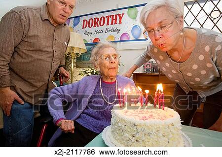 Detroit, Michigan - Woman celebrates her 100th birthday with her daughter and son View Large Photo Image Stock Photograph - Detroit, Michigan - Woman celebrates her 100th birthday with her daughter and son. Fotosearch