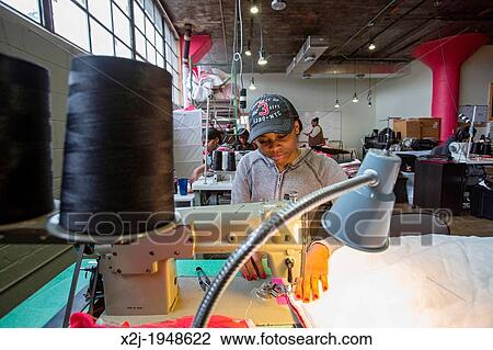 Detroit, Michigan - Women sew coats for the homeless at the nonprofit Empowerment Plan. View Large Photo Image Stock Image - Detroit, Michigan - Women sew coats for the homeless at the nonprofit Empowerment Plan.. Fotosearch