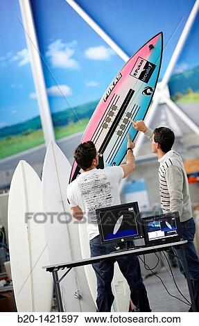 Stock Photo - Developing the world's first surfboard with integrated technology to research and characterise the mechanical behaviour of surfboards, Surfsens PUKAS and Tecnalia research centre joint project, San Sebastian, Donostia, Gipuzkoa, Euskadi, Spain. Fotosearch