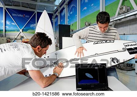 Developing the world's first surfboard with integrated technology to research and characterise the mechanical behaviour of surfboards, Surfsens PUKAS and Tecnalia research centre joint project, San Sebastian, Donostia, Gipuzkoa, Euskadi, Spain View Large Photo Image Stock Photograph - Developing the world's first surfboard with integrated technology to research and characterise the mechanical behaviour of surfboards, Surfsens PUKAS and Tecnalia research centre joint project, San Sebastian, Donostia, Gipuzkoa, Euskadi, Spain. Fotosearch