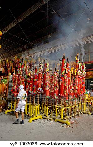 Devotees burning large candles, Vegetarian festival at San Jao Sieng Kong shrine, wat sung heng yee, Chinatown, Bangkok, View Large Photo Image Stock Photograph - Devotees burning large candles, Vegetarian festival at San Jao Sieng Kong shrine, wat sung heng yee, Chinatown, Bangkok,. Fotosearch