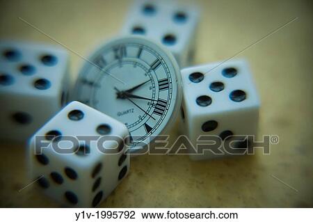 Dice and the inside of a wristwatch. View Large Photo Image Stock Image - Dice and the inside of a wristwatch.. Fotosearch