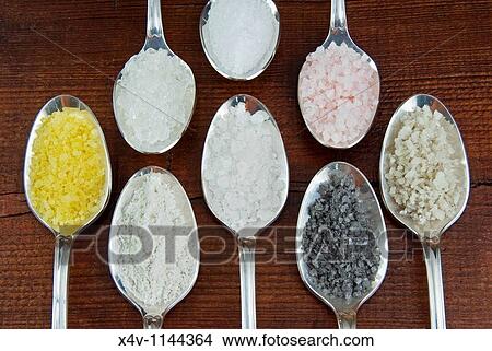 Different types of salt, From left clockwise: Lemon salt, Dead Sea coarse salt, Italian fine sea salt, Himalayan coarse pink salt, French Atlantic Ocean coarse salt, Black Lava Hawaiian coarse salt, Maltese coarse sea salt, French Atlantic Ocean fine salt View Large Photo Image Picture - Different types of salt, From left clockwise: Lemon salt, Dead Sea coarse salt, Italian fine sea salt, Himalayan coarse pink salt, French Atlantic Ocean coarse salt, Black Lava Hawaiian coarse salt, Maltese coarse sea salt, French Atlantic Ocean fine salt. Fotosearch