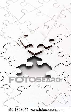 Stock Photography - digital enhancement - parts of jigsaw - symbolism for existential orientation resp education. Fotosearch