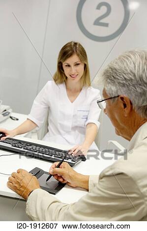Digital signature, Reception of patients, Onkologikoa Hospital, Oncology Institute, Case Center for prevention, diagnosis and treatment of cancer, Donostia, San Sebastian, Gipuzkoa, Basque Country, Spain View Large Photo Image Stock Photo - Digital signature, Reception of patients, Onkologikoa Hospital, Oncology Institute, Case Center for prevention, diagnosis and treatment of cancer, Donostia, San Sebastian, Gipuzkoa, Basque Country, Spain. Fotosearch