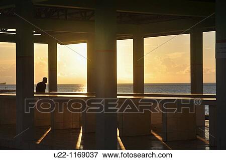 Dili (East Timor): sunset at the beach near Areia Branca View Large Photo Image Stock Photo - Dili (East Timor): sunset at the beach near Areia Branca. Fotosearch