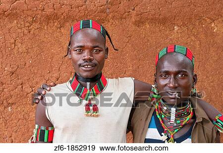 Dimeka Ethiopia Africa village Lower Omo Valley portrait of young Hamar guys portrait 18 View Large Photo Image Stock Photo - Dimeka Ethiopia Africa village Lower Omo Valley portrait of young Hamar guys portrait 18. Fotosearch