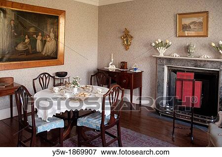 Dining room in the 18th-century Rosehill House, home of a Quaker family of ironmasters at Coalbrookdale in the Ironbridge Gorge, Shropshire, England View Large Photo Image Stock Photo - Dining room in the 18th-century Rosehill House, home of a Quaker family of ironmasters at Coalbrookdale in the Ironbridge Gorge, Shropshire, England. Fotosearch