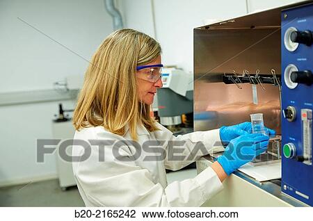 Stock Image - Dip-coating. Laboratory. Energy and Environment Division. Tecnalia Research and Innovation. Derio. Bizkaia. Basque Country. Spain.. Fotosearch