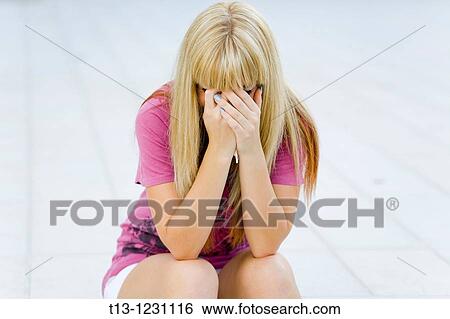 Stock Photograph - Disappointed young woman. Fotosearch