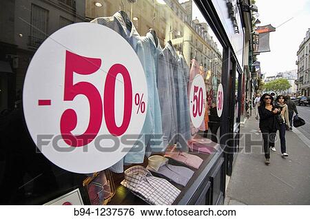Stock Photograph - Discounts in a shirt store. Paris. France.. Fotosearch