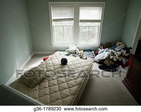 Stock Image - Disheveled bedroom of foreclosed home in Talahassee, Florida, United States. Fotosearch