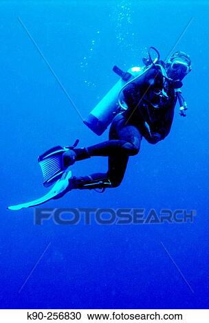 Diver. Archipelago of Raja Ampat. Papua, Indonesia View Large Photo Image Stock Image - Diver. Archipelago of Raja Ampat. Papua, Indonesia. Fotosearch
