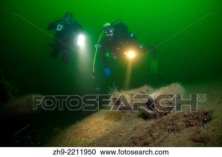 Stock Image - Diver at the plane wreck of the German Junkers Ju-52, Odessa, Black Sea, Ukraine, Eastern Europe, Europe.. Fotosearch