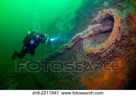 Diver at the shipwreck of the German transport vessel "Salzburg", In this transport ship died in 2300 of Soviet prisoners of war. Black Sea, Ukraine, Eastern Europe, Europe. View Large Photo Image Stock Photo - Diver at the shipwreck of the German transport vessel "Salzburg", In this transport ship died in 2300 of Soviet prisoners of war. Black Sea, Ukraine, Eastern Europe, Europe.. Fotosearch
