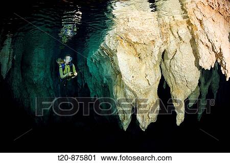 Diver in Chandelier Dripstone Cave, Micronesia, Palau View Large Photo Image Stock Image - Diver in Chandelier Dripstone Cave, Micronesia, Palau. Fotosearch