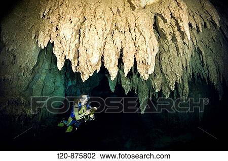 Diver in Chandelier Dripstone Cave, Micronesia, Palau View Large Photo Image Stock Image - Diver in Chandelier Dripstone Cave, Micronesia, Palau. Fotosearch