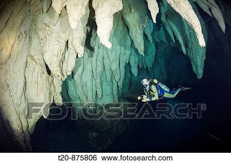 Diver in Chandelier Dripstone Cave, Micronesia, Palau View Large Photo Image Stock Photograph - Diver in Chandelier Dripstone Cave, Micronesia, Palau. Fotosearch