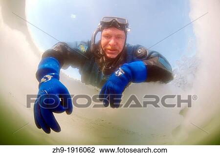 Diver's hand giving the OK sign, subglacial diving, ice diving, in the frozen Black Sea, a rare phenomenon, last time it occured in 1977, Odessa, Ukraine, Eastern Europe View Large Photo Image Stock Image - Diver's hand giving the OK sign, subglacial diving, ice diving, in the frozen Black Sea, a rare phenomenon, last time it occured in 1977, Odessa, Ukraine, Eastern Europe. Fotosearch
