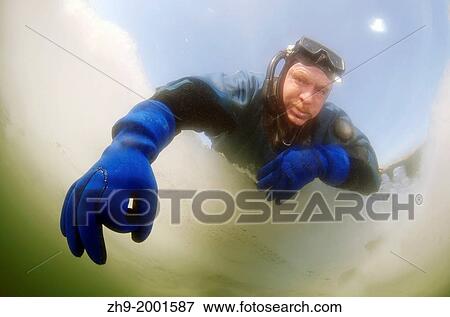 Diver's hand giving the OK sign, subglacial diving, ice diving, in the frozen Black Sea, a rare phenomenon, last time it occured in 1977, Odessa, Ukraine, Eastern Europe. View Large Photo Image Stock Photo - Diver's hand giving the OK sign, subglacial diving, ice diving, in the frozen Black Sea, a rare phenomenon, last time it occured in 1977, Odessa, Ukraine, Eastern Europe.. Fotosearch