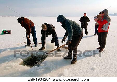 Picture - Divers, preparing for subglacial diving, ice diving, in the frozen Black Sea, a rare phenomenon, Odessa, Ukraine, Eastern Europe. Fotosearch