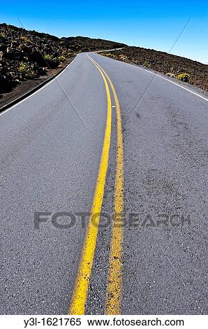 Dividing line on road going-up to crater on Haleakala volcano, Maui Island, Hawaii Islands, USA View Large Photo Image Stock Photography - Dividing line on road going-up to crater on Haleakala volcano, Maui Island, Hawaii Islands, USA. Fotosearch